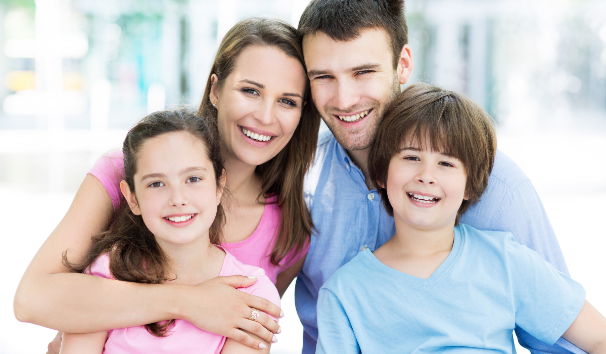 Family dentist examining patient for early signs of oral health issues at Pavilion Dentistry